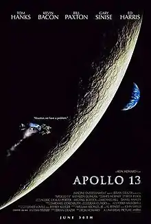 The Apollo 13 spacecraft passes the Moon with vapor streaming from the side of it, with a crescent Earth in the distance. The words "Houston, we have a problem" appear directly above the craft. The names of the principal actors appear at the top, and the title APOLLO 13 appears at the lower right.