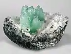 Isolated Fluorapophyllite-(K) cluster on contrasting matrix