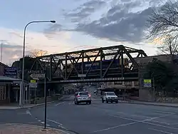 Argyle Street railway bridge, Moss Vale. Photo taken on the corner of Arthur and Argyle Street. There is a train passing over the bridge at the moment this photo was taken.