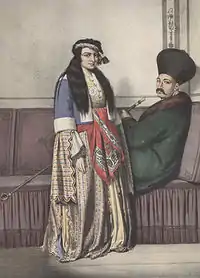 A hand-coloured lithograph by Louis Dupré in his travel book, Voyage à Athènes et à Constantinople. Depicted here are an Armenian prince and his Turkish wife.