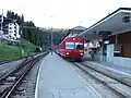 Looking from the lower end of the station, a train waits to depart (between the two main platforms)