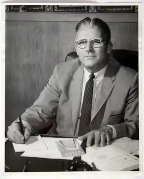 Arthur S. Huey at his desk in the original Homestead Building ca. 1960, around the time he and his wife Helen Mautz Huey relinquished private ownership of the Leelanau Schools, giving them to The Leelanau Schools and Library Foundation