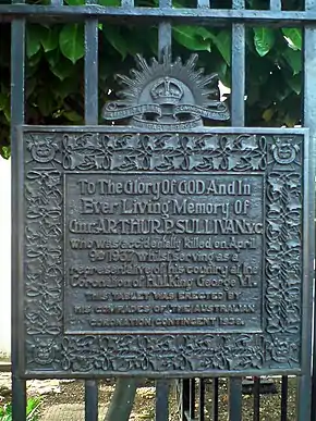 a photograph of a brass plaque