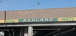 Ashland community marker painted on I-238 overpass at Mission Blvd