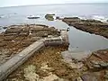 Auckengill Jetty with man made dock.