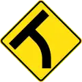 (W2-14) T-junction beyond a curve to left