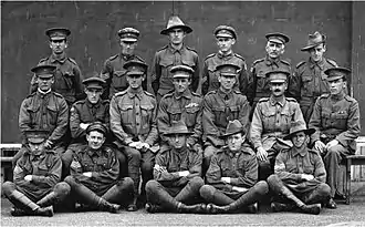 Formal portrait of three rows of uniformed men