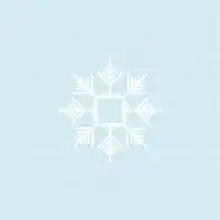 A detailed image of a snowflake, on a blue background.