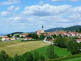 The church and surrounding buildings, in Aveize