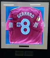 A red Liverpool shirt with the number eight and Gerrard's name on the back