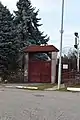 The entrance gate to the platform of Băneasa Royal Railway Station, built in traditional Romanian style