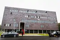 BSB operators abseiling from the roof of the new headquarters at Camp New Amsterdam, in 2015