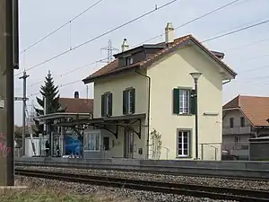 Two-story building with gabled roof