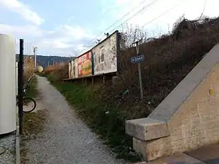 A pedestrian path to Innsbruck Hötting station as seen from Fürstenweg street.