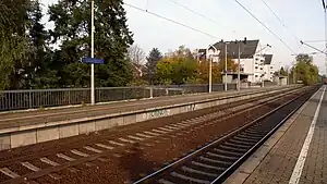 Double-tracked railway line with side platforms