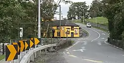 N55 road passing the local pub in Ballykeeran