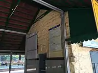 Bangalore East railway station, ticket counter. The original British period stone building.