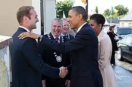 Henry Healy greets his eighth cousin, Barack Obama