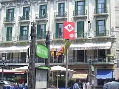 Entrance to the station with the imitation of the former "modernist" sign