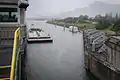 The swing bridge is open as a barge approaches the Bonneville Navigation Locks