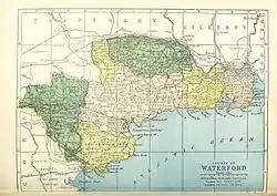 Barony map of County Waterford, 1900; Decies-without-Drum is coloured pink, in the centre.