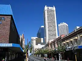 Photograph of road and city buildings