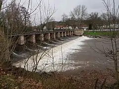 The dam on the River Bruche that feeds the canal