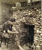 Westie starting a fire in the island cabin