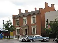 A view of the front of the Batavia Club building.