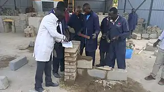 Students taking instructions at the Building and Civil Engineering Lab