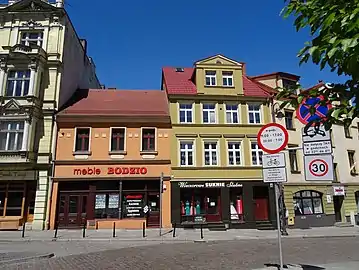 N.o3 (left) with orange painted facade