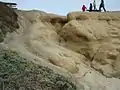 A stretch of rock eroded by wind, water, and sand