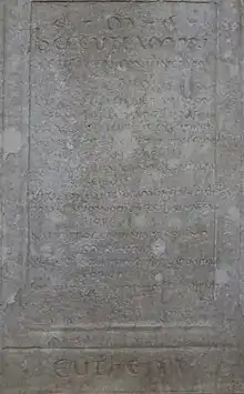 General view of the part of a stone bearing Latin inscriptions