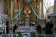 Main altar in the church in Będków