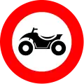 C6: No entry for drivers of motor vehicles with four wheels, constructed for off-road use, with an open bodywork, a steering wheel as on a motorcycle and a saddle