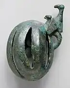 Western Iran, circa 1000-650 B.C. Bronze, cast bell, 2 3/8 x 3 7/8 inches.