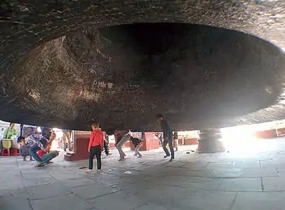 Children under Mingun Bell, showing graffiti as of December 2014