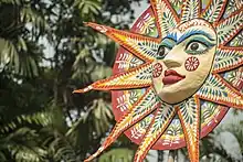 Image 8A sun motif in Mangal Shobhajatra, a parade takes place in Bangladesh in the occasion of Pohela Boishakh (from Culture of Bangladesh)