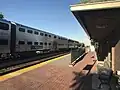 An outbound train towards Elgin stopped at the Bensenville Metra station.