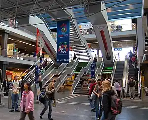 Multiple floors linked by stairs and escalators