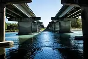 view across a river between two bridges