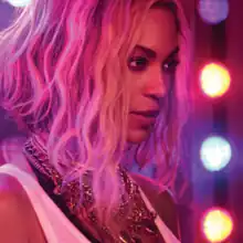 Cover art for "XO": Beyoncé, who sports short hair, neck accessories, and a white tank top, bathed in purple lights