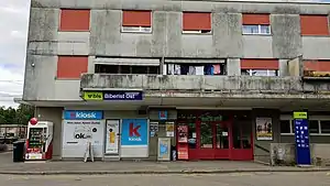 Three-story rectangular building with flat roof