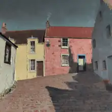 A painting by Dale Bissland of the fishing town of Crail in Scotland, showing a brick street leading towards joined yellow and pink houses, with smoke rising from a chimney on the pink house