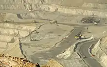 Blast-hole drilling at the Bingham Canyon Mine, Utah. Note the pattern of drill holes being prepared for blasting.