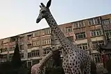 A random giant giraffe display in an old apartment complex (2006)