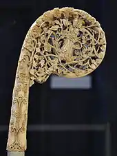 Head of a crosier from Norway showing St Olaf with his axe. Victoria and Albert Museum. (1375-1400)