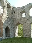 Stonework arches seen in a ruined stonework building – Burg Lippspringe, Germany (2005)