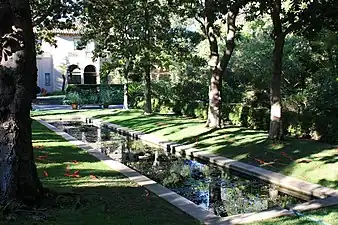 Eastern facade and reflecting pool with magnolia trees