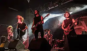 Bleed from Within live in Nuremberg in 2013. From left to right: Craig Gowans, Scott Kennedy, Davie Provan, Ali Richardson (background) and Martyn Evans.